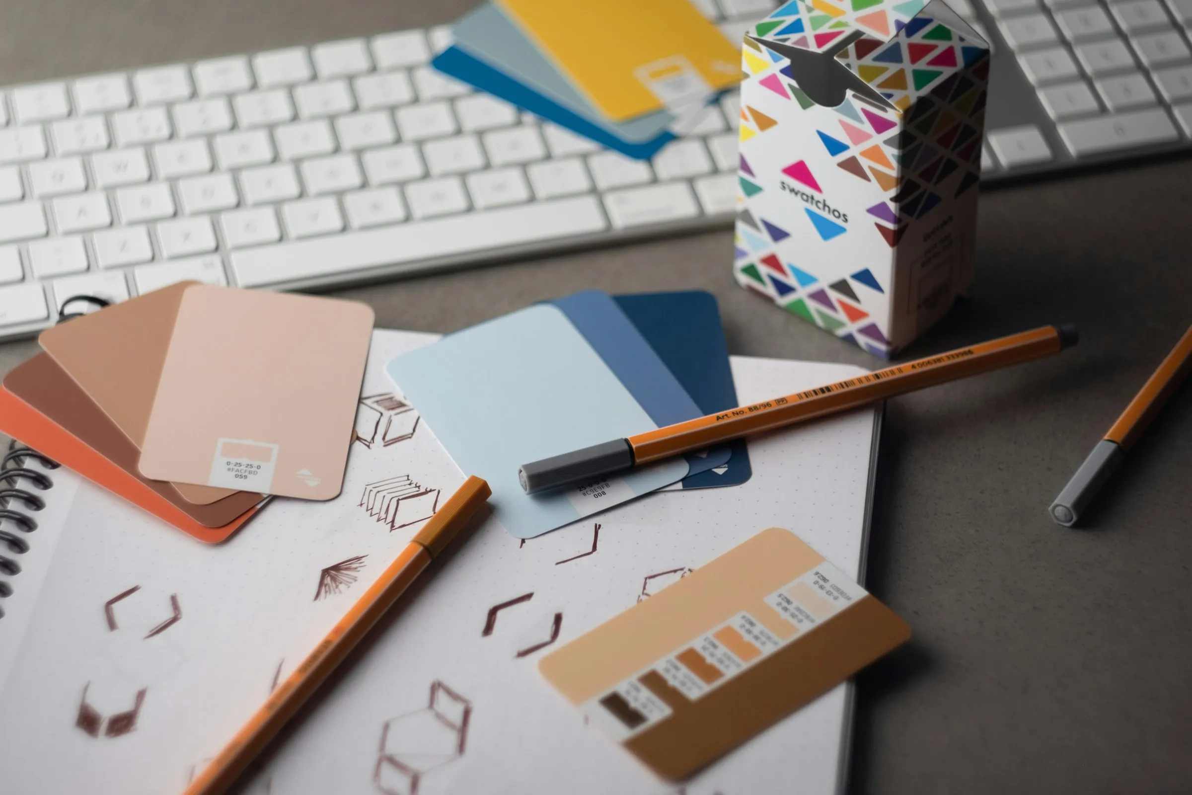 Colour swatches and pencils for brand design